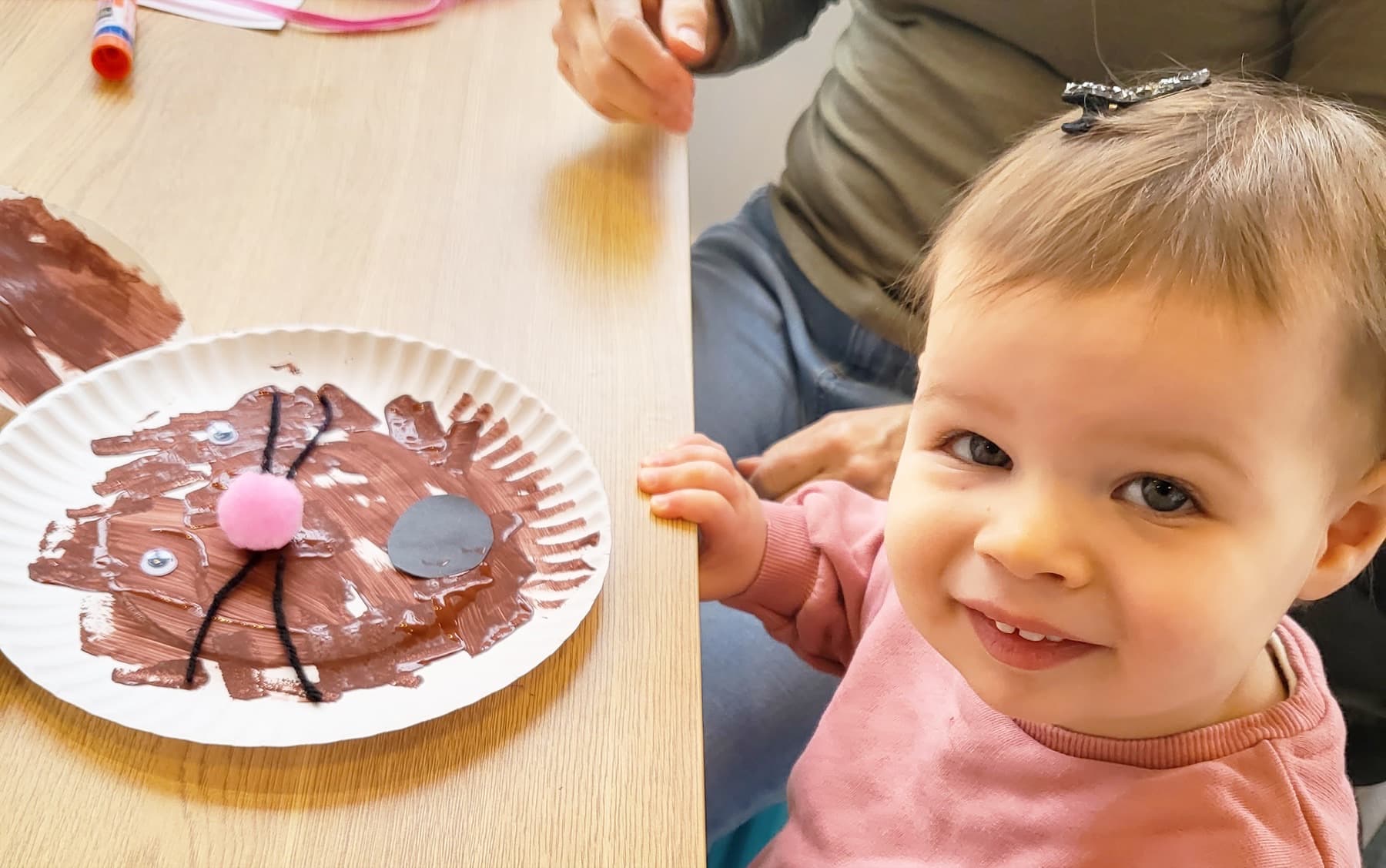 A grown up and toddler making art together at PLAYDAY